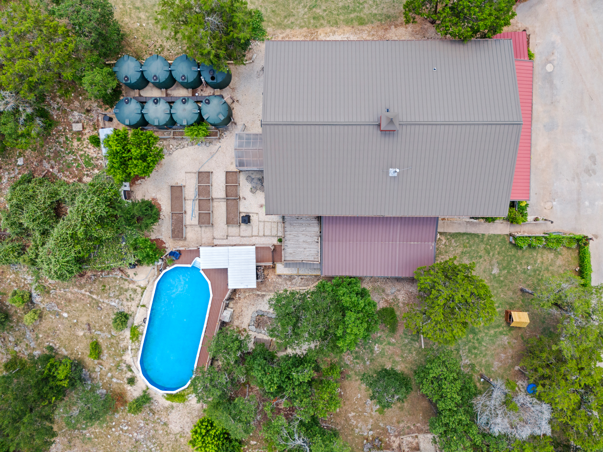 Top-down aerial view showing the rainwater storage system at 320 Pecan 3